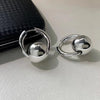 Sleek Round Ball Ear Clips In A Cool Western-style Design