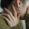 Sleek Round Ball Ear Clips In A Cool Western-style Design